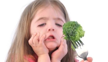 Girl Eating Broccoli dreamstime_s_31105620