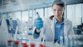 Medical,Research,Laboratory:,Portrait,Of,A,Beautiful,Female,Scientist,In